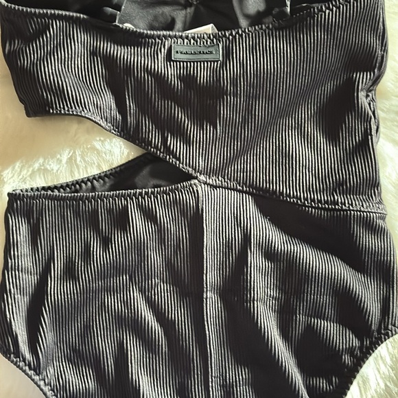 Fabletics Asymmetrical Cutout One Piece Swimsuit 💜 - Picture 8 of 12